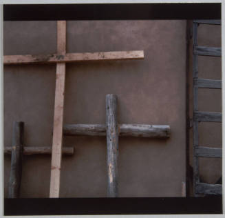 Crosses Leaning Against the Outside Wall of Chapel at Chamita